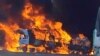 Smoke rises as a truck burns near the Myanmar-China border, near Muse, Myanmar, in this screen grab obtained from a social media video released on Nov. 23, 2023. 