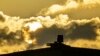 FILE - An air defense system is seen during sunset on the roof of the main building of the Russian Defense Ministry in Moscow, Nov. 1, 2023. Air defense systems have been put in many areas of Moscow as protection against Ukrainian drone attacks. 