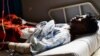 Ugandan LGBTQ activist Steven Kabuye receives treatment at a hospital after he was attacked and stabbed by unknown people, in Kitende on the outskirts of Kampala, Uganda, Jan. 3, 2024