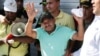 Luis Manuel Diaz waves outside his home in Barrancas, Colombia, after he was released by kidnappers, Nov. 9, 2023. Diaz, father of Liverpool soccer player Luis Diaz, was kidnapped on Oct. 28 by the guerrilla group National Liberation Army, or ELN. 