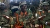Vincent Otti, the deputy commander of Uganda's Lord Resistance Army (LRA) addresses a news conference in Ri-Kwangba, near the Sudan-Congo border, Sept. 20, 2006.