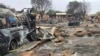 FILE - This picture taken on Sept. 1, 2023, shows a view of destruction in a livestock market area in al-Fasher, the capital of Sudan's North Darfur state. 
