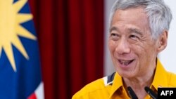Singapore's Prime Minister Lee Hsien Loong speaks during a joint press conference with Malaysia's Prime Minister Anwar Ibrahim (not pictured) at the Istana or Presidential Palace in Singapore, Oct. 30, 2023. 