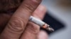 This picture taken shows a man as he smokes a cigarette in Sundbyberg, near Stockholm, Oct. 31, 2023. Sweden is poised to soon become Europe's first smoke-free country largely thanks to the popularity of snus. 
