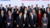 U.S. Secretary of State Antony Blinken, front center right, and North Macedonia Foreign Minister Bujar Osmani, front center left, are pictured with other officials at the Organization for Security and Cooperation in Europe meeting in Skopje, North Macedonia, Nov. 29, 2023. 