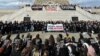 This handout picture provided by the Jewish Voice for Peace shows activists calling for a cease-fire between Israel and the Palestinian militant group Hamas in the Gaza Strip at the Statue of Liberty in New York, Nov. 6, 2023.