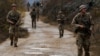 British troops, part of NATO's reinforcements, patrol the Kosovo-Serbia border in Jarinje, Kosovo, Nov. 24, 2023. 