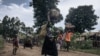 Residents of Bambo in Rutshuru territory, 60 kilometers north of Goma, the capital of North Kivu, eastern Democratic Republic of Congo, flee as the M23 attacked the town, Oct. 26, 2023. 