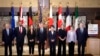 Josep Borrell, left, the European Union's foreign policy chief, stands with the foreign ministers of G7 countries in Tokyo, Nov. 8, 2023. While meeting, the ministers expressed support for humanitarian pauses in the Israeli-Hamas war. 