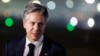 US Secretary of State Antony Blinken begins to board his plane to travel home to Washington from Palam Air Base in New Delhi, India, Nov. 10, 2023. 