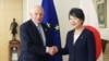 The European Union foreign policy chief Josep Borrell shakes hands with Japanese Foreign Minister Yoko Kamikawa as they pose for the cameras during their bilateral meeting at the foreign ministry in Tokyo, Nov. 8, 2023.