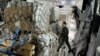 Humanitarian aid to be delivered for Gaza is loaded on a French Air Force army plane before takeoff from at Orleans Air Base, France, Nov. 4, 2023.