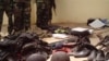 Soldiers stand behind items recovered from suspected Boko Haram members, Bukavu Barracks in Kano, Nigeria, March 21, 2012 (file photo).