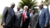 Le président américain Donald Trump pose avec des dirigeants africains, de gauche, le président kenyan Uhuru Kenyatta, le président de l'Union africaine Alpha Condé, le président de la Banque africaine de développement Akinwumi Adesina, le vice-président nigérian Yemi Osinbajo et le premier ministre éthiopien Haile Mariam Desalegn, dans la ville sicilienne de Taormina, Italie, 27 mai 2017. 