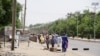 FILE - People flee the northeastern Nigerian city of Maiduguri in Borno State, May 14, 2015.