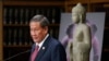 Surrounded by Cambodian antiquities, Cambodian ambassador to the United States Keo Chhea speaks during a news conference in New York, Monday, Aug. 8, 2022. (AP Photo/Seth Wenig)