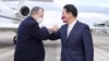 Mike Mullen, former chairman of the U.S. Joint Chiefs of Staff greets Taiwan Foreign Minister Joseph Wu as he and other members of the U.S. delegation arrive at Taipei Songshan airport in Taipei, Taiwan March 1, 2022.