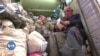Mostafa, 68 ans, fabricant et réparateur de ballons de football