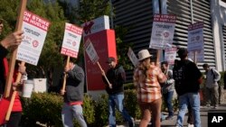 Members of the Culinary Workers Union picket in front of the Virgin Hotels Las Vegas in Las Vegas, Nevada, Nov. 15, 2024.