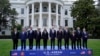 President Joe Biden and leaders from the Association of Southeast Asian Nations (ASEAN) participate in a group photo on the South Lawn of the White House in Washington, Thursday, May 12, 2022. (AP Photo/Susan Walsh)