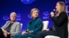 FILE - The Clintons – Bill, Hillary and daughter Chelsea – speak at a 2014 Clinton Global Initiative University at Arizona State University in Tempe. Some say the Clinton Foundation poses a conflict of interest for the Democratic presidential candidate.