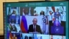 FILE - Russian President Vladimir Putin takes part in a video conference during the G20 Leaders' Summit 2020, Nov. 21, 2020. 