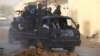 Free Syrian Army fighters on a pick-up truck, head towards the frontline where clashes with forces loyal to Syria's President Bashar al-Assad are taking place, in Damascus May 5, 2013. 