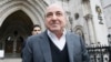 FILE - Self-exiled oligarch Boris Berezovsky leaves the High Court in London, March 10, 2010.