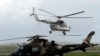 FILE - A World Food Programme (WFP) helicopter takes off, in Beira, Mozambique, March 22, 2019. 
