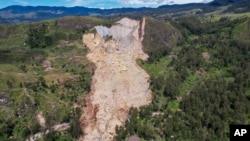 Devastation caused by a landslide is seen in Yambali village, in the Highlands of Papua New Guinea, May 27, 2024. (Juho Valta/UNDP Papua New Guinea via AP)