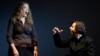 FILE - Conductor Teodor Currentzis, right, accompanies U.S. opera singer Mardi Byers during premiere of Alban Berg opera "Wozzek," Bolshoi theater, Moscow.