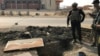 A soldier with Iraq's elite counterterrorism force inspects a tunnel made by Islamic State militants in Bartella, Iraq, Oct. 27, 2016. The town of Bartella in northern Iraq is about 20 kilometers east of Mosul.