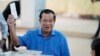 Cambodian Prime Minister Hun Sen, of the Cambodian People's Party (CPP), casts his vote at a polling station in Takhmua in Kandal province, southeast of Phnom Penh, June 5, 2022. 