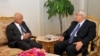 Interim President Adly Mansour, right, meets with Hazem el-Beblawi, left, in Cairo, Egypt, July 9, 2013. 