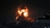 Flame and smoke are seen during an Israeli airstrike in Gaza City, March 25, 2019. 