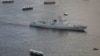 The Jinan, destroyer of People's Liberation Army (PLA) sails past Hong Kong's Victoria Habour, Tuesday, July 11, 2017. (AP Photo/Vincent Yu)