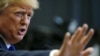 FILE - U.S. Republican presidential candidate Donald Trump quiets a reporter during a news conference before a campaign town hall meeting in Derry, New Hampshire, Aug. 19, 2015. 