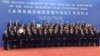 Chinese President Xi Jinping, ninth from right, poses for a group photo with Swiss Economy Minister Johann Schneider-Ammann, ninth from left, and delegates attending the signing ceremony for the Articles of Agreement of the Asian Infrastructure Investment