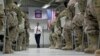 FILE - U.S. Defense Secretary Ash Carter talks to U.S. troops at the Baghdad International Airport in Baghdad, Iraq, in July 2015.