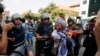 Trial Opens for 23 Labor Activists Accused of Incitement