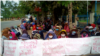 FILE - Land disputants gather in front of Koh Kong provincial court on Thursday as five villagers were questioned, November 12, 2020. (Photo courtesy of Adhoc)