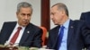 FILE - Turkey's Prime Minister Recep Tayyip Erdogan (r) and his deputy Bulent Arinc. 