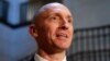 Carter Page, a foreign policy adviser to Donald Trump's 2016 presidential campaign, speaks with reporters following a day of questions from the House Intelligence Committee, on Capitol Hill in Washington, Nov. 2, 2017.