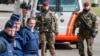 Belgian police men and soldiers secure the area outside Zaventem Airport in Brussels, March 29, 2016. 