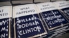 FILE - A box of Hillary Clinton's book "What Happened" are staged to be distributed outside the Warner Theatre in Washington, Sept. 18, 2017.