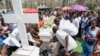 Relatives and friends gather during the funeral of Patrick Ndikumana, July 3, 2015, in Bujumbura, Burundi.