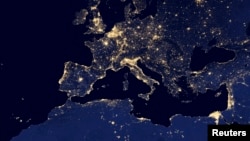 FILE - A nighttime view of Europe and North Africa is seen in a global composite assembled from data acquired by the Suomi National Polar-orbiting Partnership (Suomi NPP) satellite in 2012 and released by NASA Oct. 2, 2014.