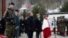 Swiss President Viola Amherd, center, and Chinese Prime Minister Li Qiang, center left, attend a welcoming ceremony prior to a meeting as part of his official visit in Kehrsatz, on Jan. 15, 2024.