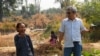 Im Chaem, a former Khmer Rouge regional commander, in a picture with Youk Chhang, executive director of the Documentation Center of Cambodia, in Anlong Veng, Cambodia, February 13, 2012. (Courtesy of Documentation of Cambodia)