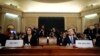Former White House national security aide Fiona Hill, and David Holmes, a U.S. diplomat in Ukraine, arrive to testify before the House Intelligence Committee on Capitol Hill in Washington, Thursday, Nov. 21, 2019, during a public impeachment hearing of Pr